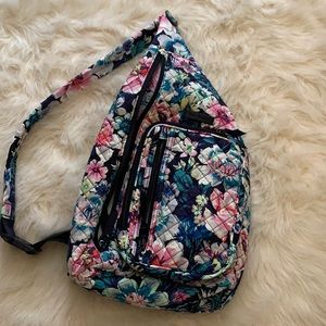 Vera Bradley sling back pack with matching wallet.